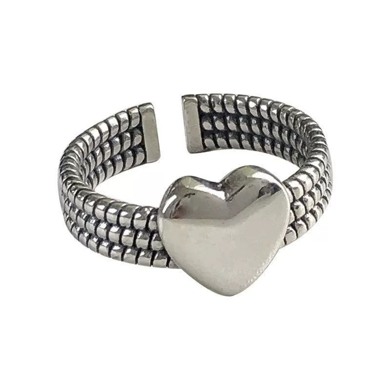 "Women's Retro Hollowed Heart Shape Ring in Pure Silver"